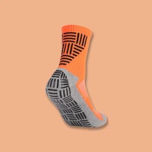 Orange GripMax Mid-Calf Treadplate Grip Socks on display